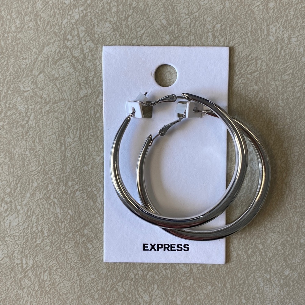 New with tags. Loop earrings